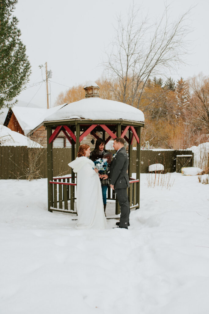 Private winter elopement ceremony at Inn on the Creek in Jackson Hole, Wyoming