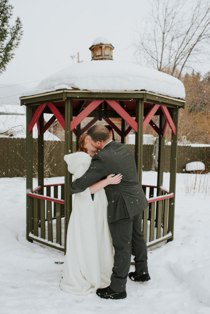 Private winter elopement ceremony at Inn on the Creek in Jackson Hole, Wyoming