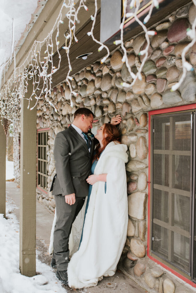 Romantic winter wedding photos at Jackson Town Square antler arches