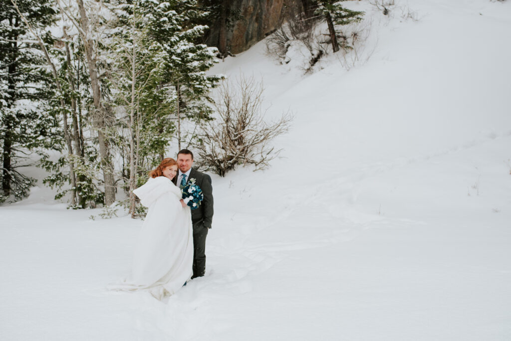 Intimate winter elopement in Grand Teton National Park with dramatic snowy mountain backdrop