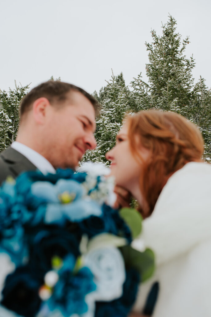 Intimate winter elopement in Grand Teton National Park with dramatic snowy mountain backdrop