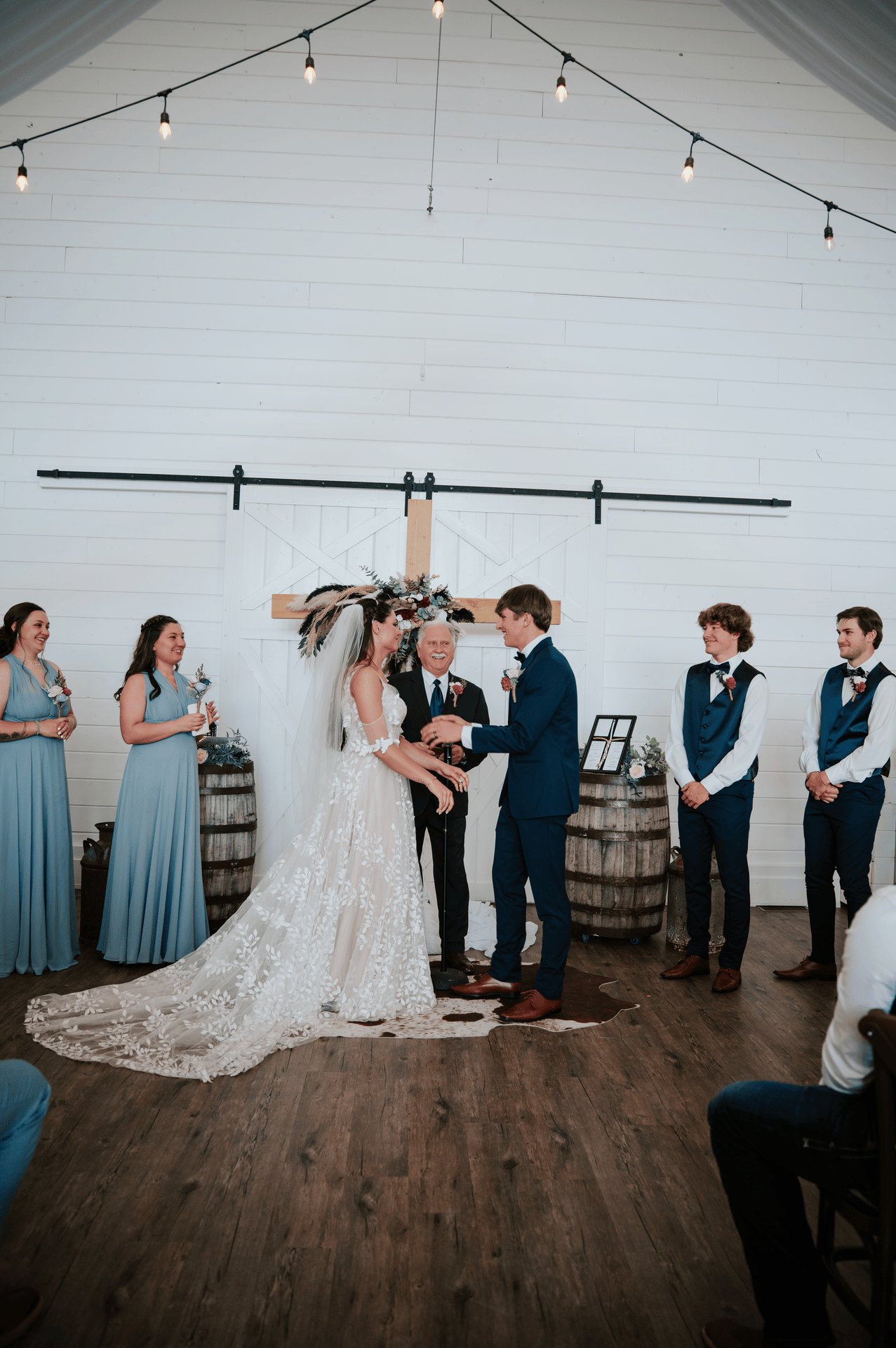 Luxury Barn on 1st wedding in Idaho Falls with romantic outdoor ceremony setup and elegant floral design