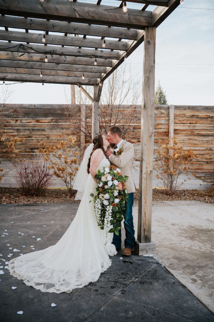 Bride and groom wedding portraits at Millhouse Venue Rigby wedding