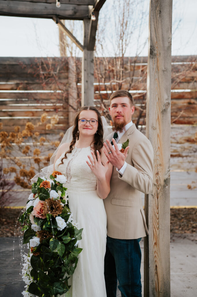 Bride and groom portraits at Millhouse Venue Rigby wedding