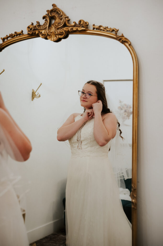 Bride getting ready for her Millhouse Venue Rigby wedding