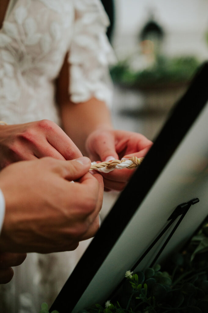 Romantic indoor ceremony at The Barn on 1st wedding venue in Idaho Falls, Idaho