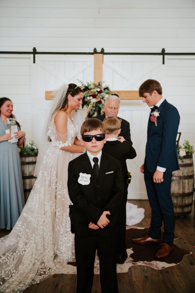 Romantic indoor ceremony at The Barn on 1st wedding venue in Idaho Falls, Idaho