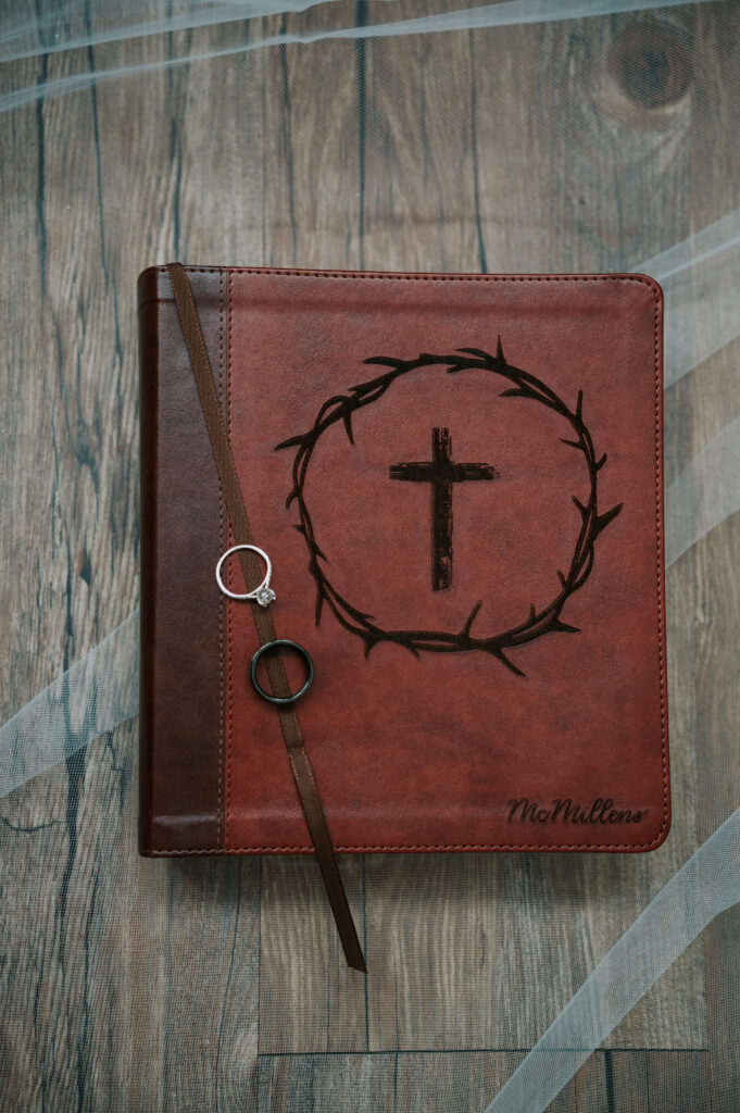 Wedding detail styling at a Barn on 1st wedding in Idaho Falls including invitation suite and heirloom rings