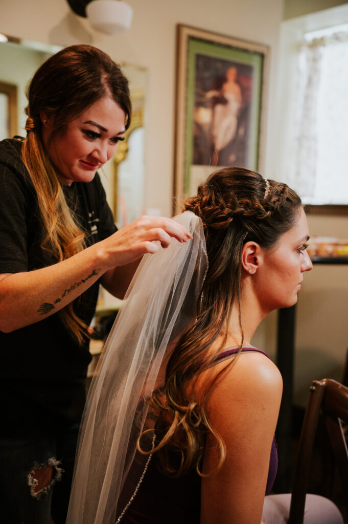 Emotional getting ready moments before a Barn on 1st wedding in Idaho Falls captured in natural light