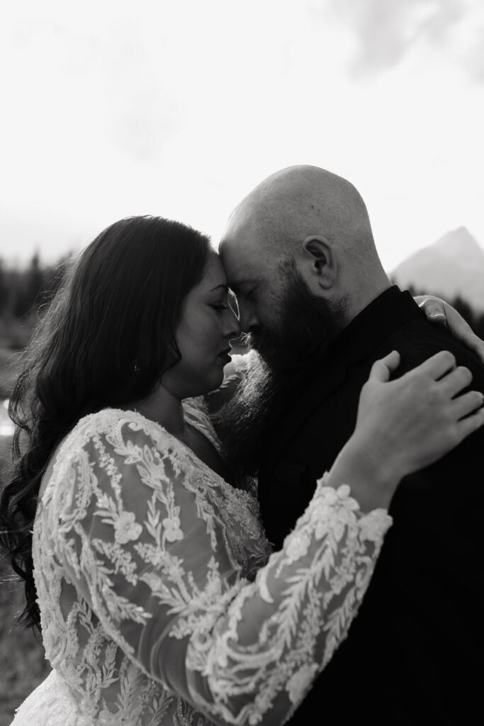 flowy wedding dress wind mountain bridal session Tetons