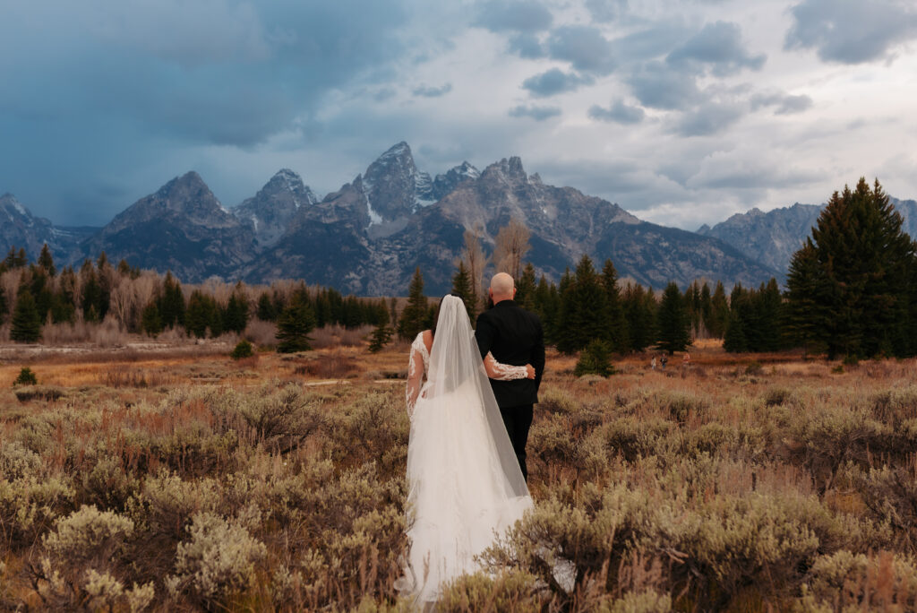 fall bridal session Tetons golden grass mountain reflection
