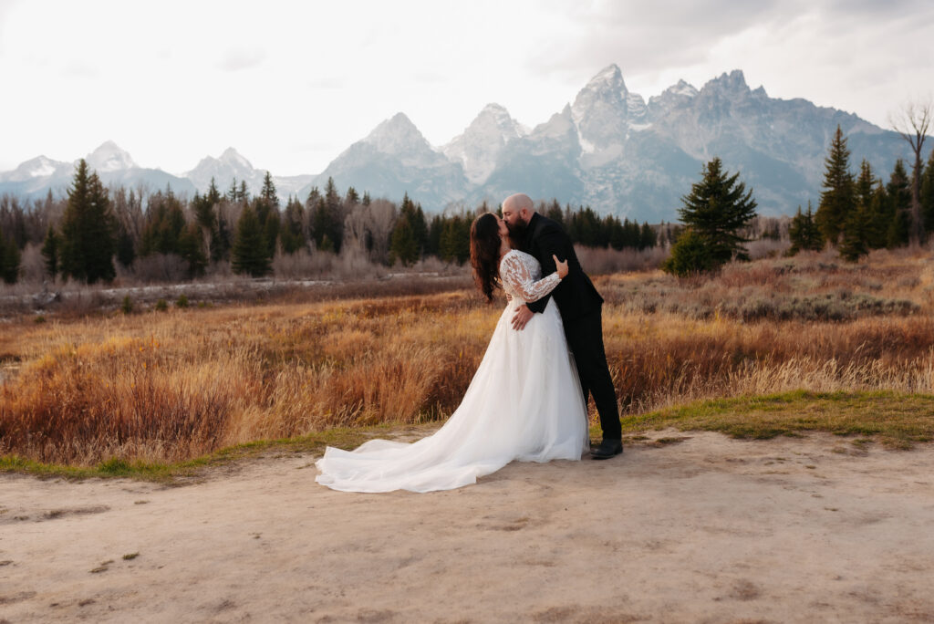 Idaho Falls bride wearing Margene’s Bridal gown in mountains