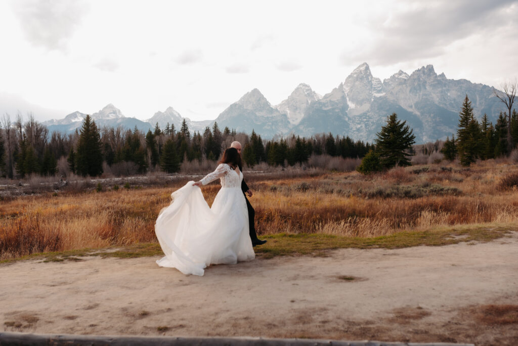 flowy wedding dress wind mountain bridal session Tetons