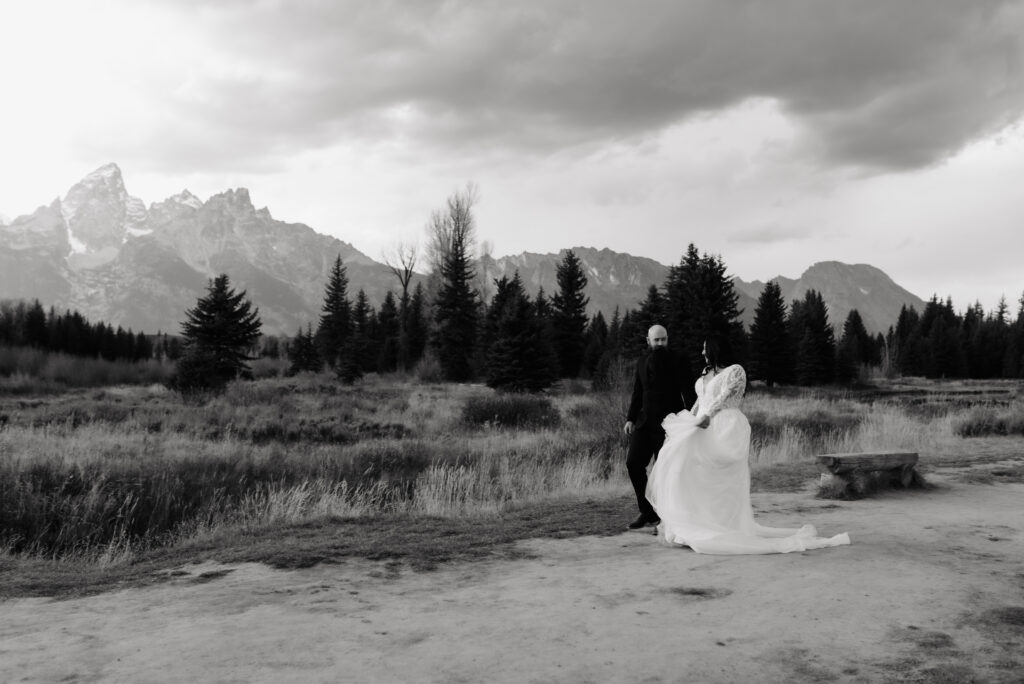 flowy wedding dress wind mountain bridal session Tetons