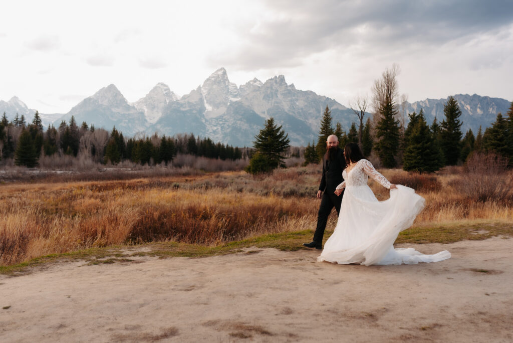 Idaho Falls bride wearing Margene’s Bridal gown in mountains